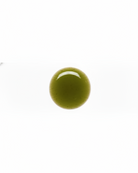 Green olive drop oil on a white background