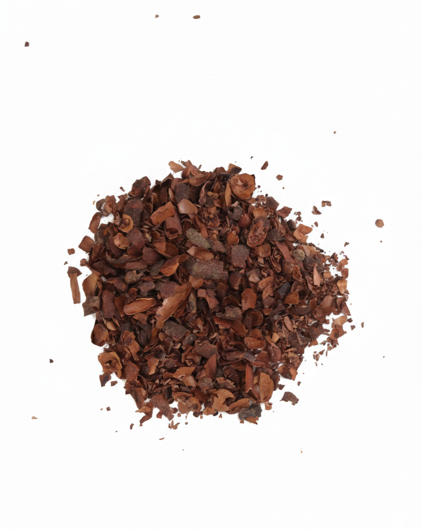 Close-up of ground cacao on a white background