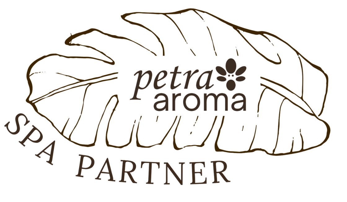 Logo of 'petra aroma' with a leaf design on a white background
