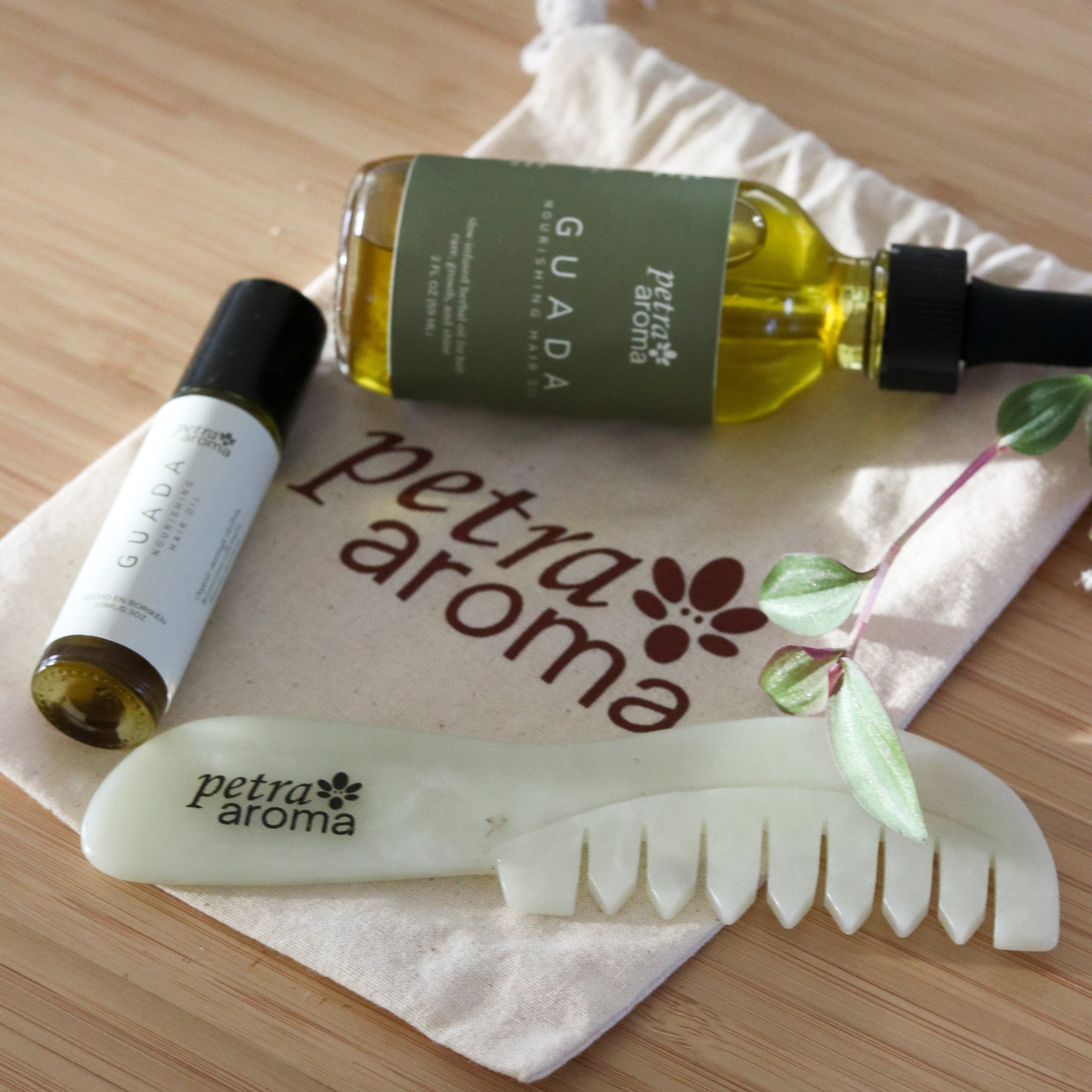Guada Complete Gift Set: dropper, roll-on and jade comb on a cotton gift bag